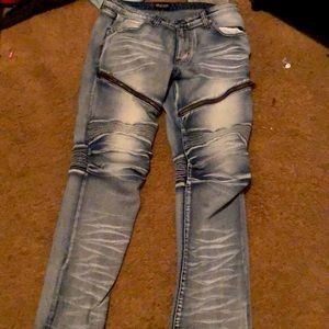 Black premium blue jeans .